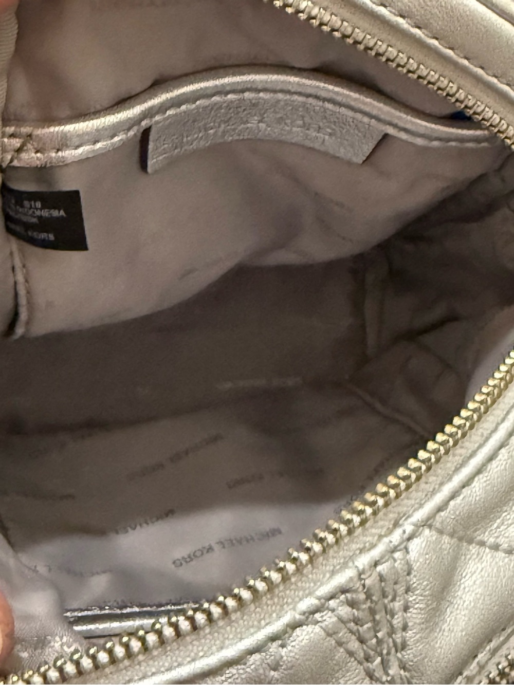 MICHAEL KORS Rhea Mini Silver Metallic Quilted Leather Mini Backpack
EUC - Picture 15 of 16